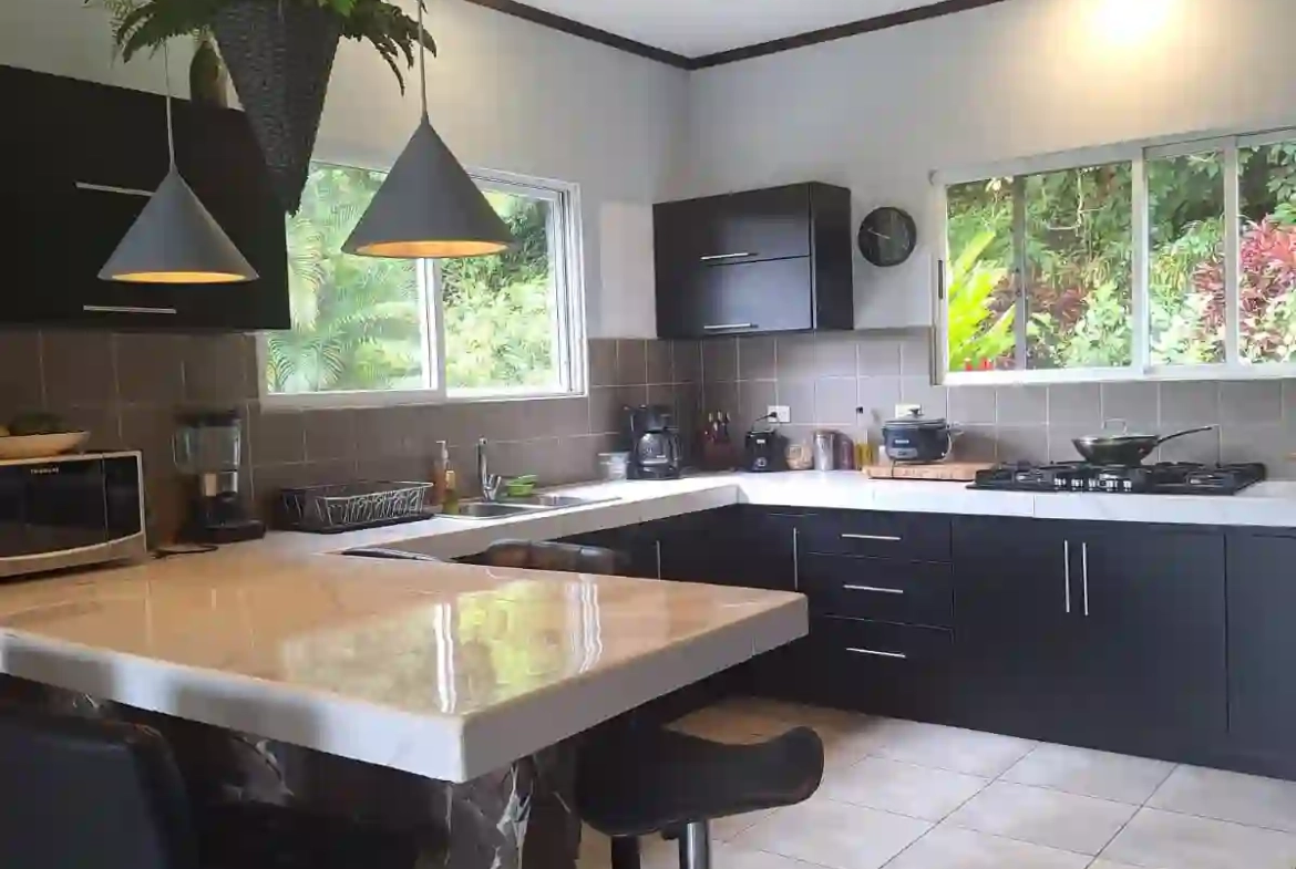 Home for Sale by Owner in Ciudad Colon with Modern Kitchen